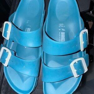 Birkenstock Aqua Sandals with Cream Buckles